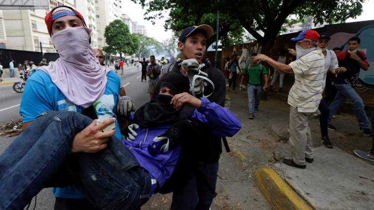 Un hombre murió baleado durante manifestación en Caracas