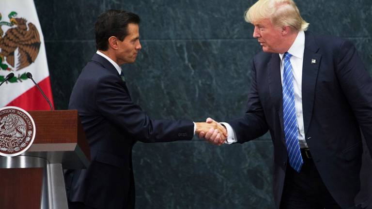 Trump y Peña acuerdan no hablar en público de muro