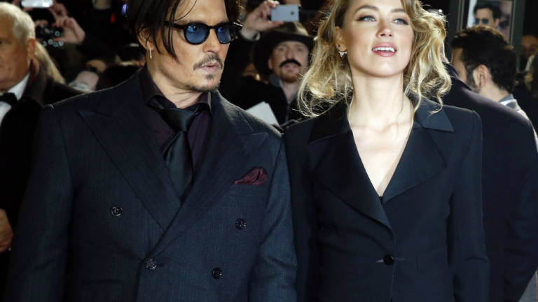 La mujer de Johnny Depp será juzgada por introducir dos perros en Australia