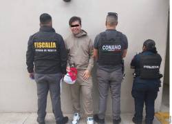 Fotografía que muestra a Márquez sonriente tras ser detenido por la Policía.