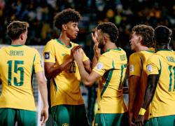 Jugadores de la selección de Australia celebrando una anotación.