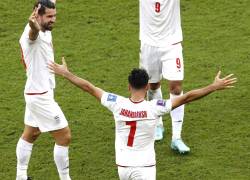 Jugadores de Irán celebran la victoria sobre Gales.