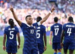France's forward #10 Kylian Mbappe celebrates scoring his team's first goal during the 2026 World Cup round of 16 football match between Paraguay and France at the Philadelphia Stadium in Philadelphia on July 4, 2026. (Photo by CHARLY TRIBALLEAU / AFP)