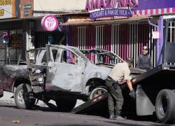 Coche bomba en unas oficinas de la SNAI en la AV 12 de Octubre entre Foch y Wilson. API / DANIEL MOLINEROS