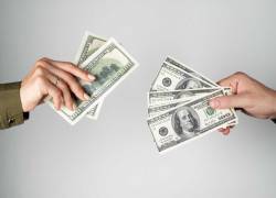 Imagen referencial de intercambio de dólares.