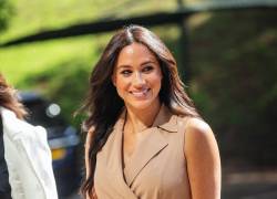 (FILES) In this file photo taken on October 01, 2019 Meghan Markle, the Duchess of Sussex arrives at the University of Johannesburg, South Africa. - Meghan Markle, the Duchess of Sussex, marked her 40th birthday August 4, 2021 with a video asking celebrity friends to help women get back to work after the pandemic. (Photo by Michele Spatari / AFP)