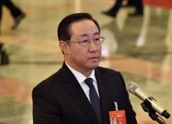 Condenan a pena de muerte en suspenso por corrupción a exministro de China