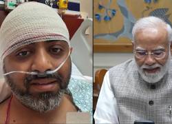 Captura de pantalla de un video publicado en el canal de YouTube de Narendra Modi donde se ve al primer ministro de India, Narendra Modi (derecha), realizando una videollamada con el piloto de Flydubai Smit Machchhar.