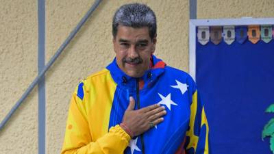 Maduro gana elecciones en Venezuela con el 51.20% de los votos, anuncia CNE Maduro gana elecciones en Venezuela con el 51.20% de los votos, anuncia CNE