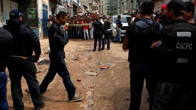 Una decena de muertos en Caracas al participar en saqueos Una decena de muertos en Caracas al participar en saqueos