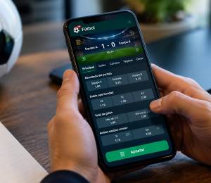 Uso de una app móvil para una apuesta de pronósticos de fútbol.