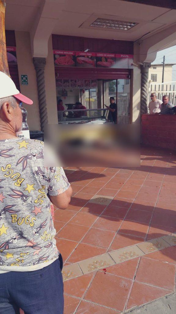 $!Fotografía con censura de la escena del crimen, en la que se observa el cuerpo del futbolista.