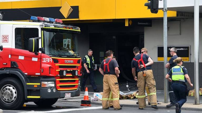 Más de veinte heridos en incendio provocado en banco australiano