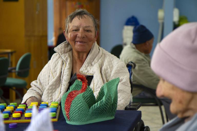 $!María Livia Luna, de 70 años, quien quedó en silla de ruedas tras ser atropellada mientras vendía ropa en las calles de Quito.