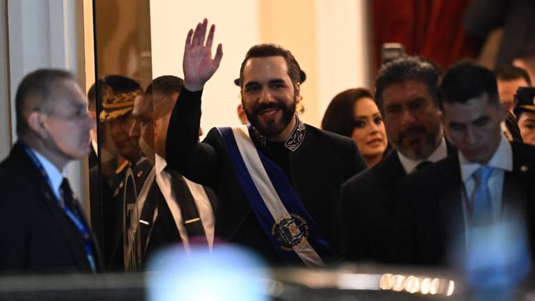 El Salvador's President Nayib Bukele leaves the National Theatre after deliver his first-year speech in San Salvador on June 1, 2025. (Photo by Marvin RECINOS / AFP)
