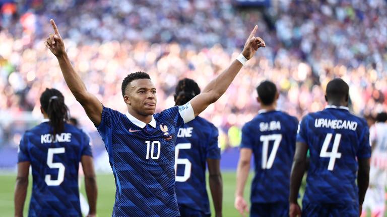 France's forward #10 Kylian Mbappe celebrates scoring his team's first goal during the 2026 World Cup round of 16 football match between Paraguay and France at the Philadelphia Stadium in Philadelphia on July 4, 2026. (Photo by CHARLY TRIBALLEAU / AFP)
