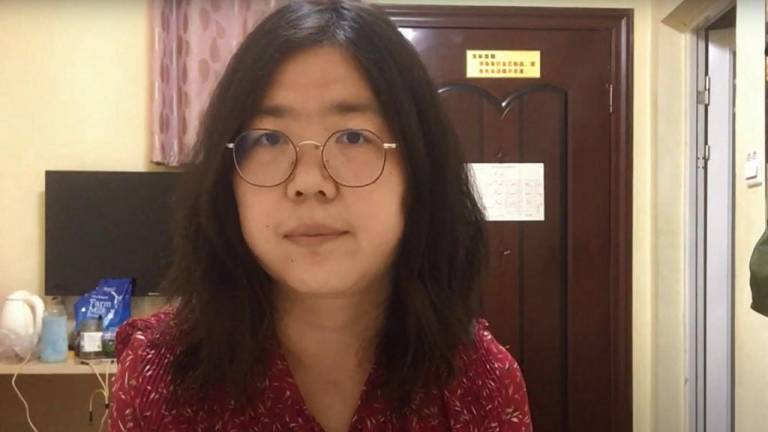 Periodista china encarcelada por cobertura del covid está al borde de la muerte