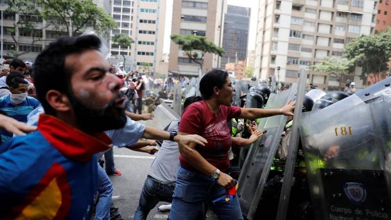 Venezuela: Chavismo y oposición marchan en Caracas