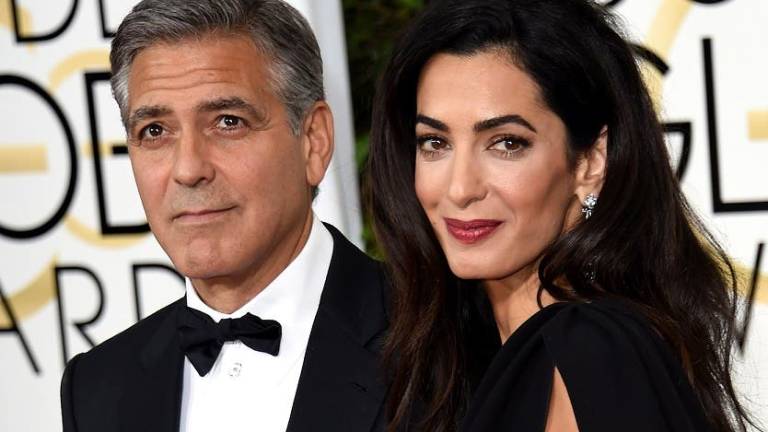 Publican falsa entrevista sobre George Clooney y su esposa