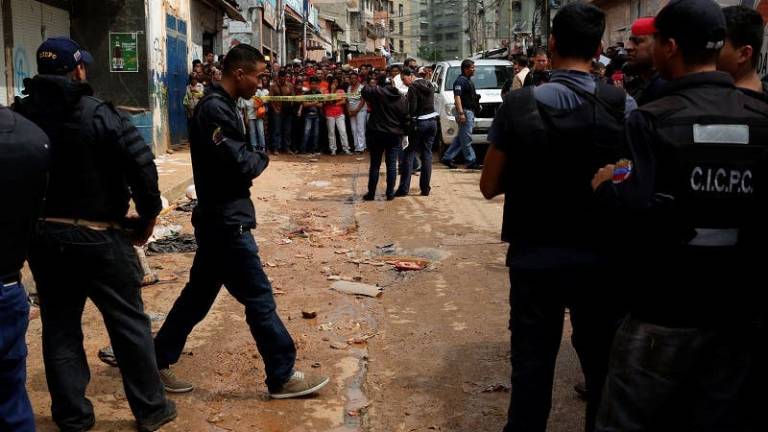 Una decena de muertos en Caracas al participar en saqueos