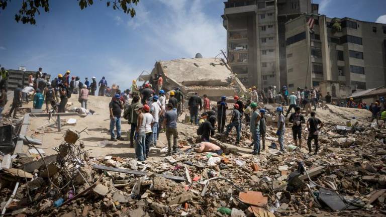 Aumentan a 589 los muertos en Venezuela y hay miles de desaparecidos en medio de la búsqueda de sobrevivientes