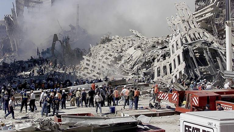 Los recuerdos del 11-S: descalzos y sin mirar atrás, huían del horror