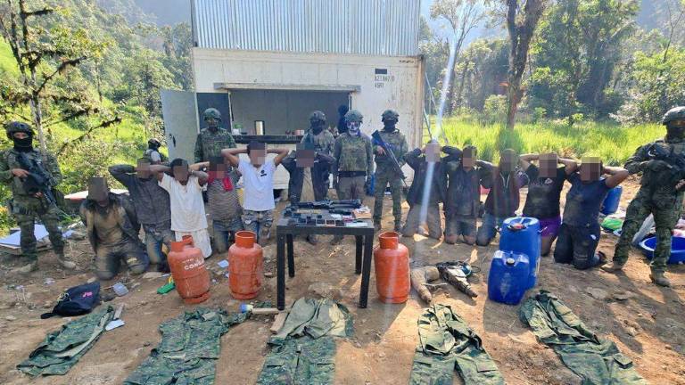Presuntos integrantes de Los Lobos hallados en mina ilegal de Santo Domingo.