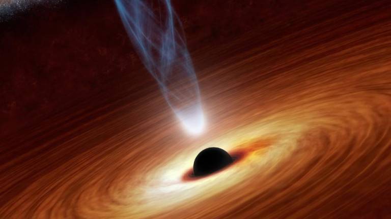 Científicos detectan 3 agujeros negros supermasivos