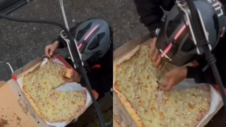 VÍDEO: Captan repartidor comiendo una porción de pizza antes de entregarla