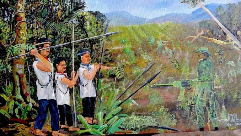 Entre dos fuegos: disputas de grupos armados amenazan con el exterminio de un pueblo indígena de Ecuador y Colombia