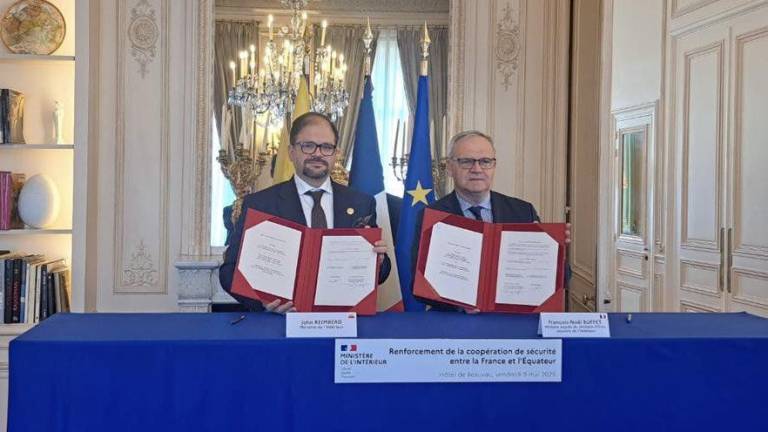 John Reimberg junto a François-Noël Buffet.